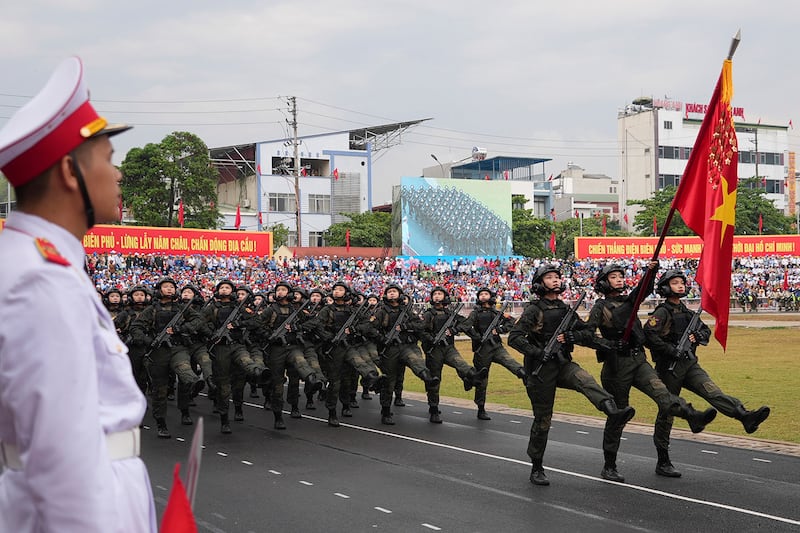 Soldiers march in a parade in Dien Bien Phu, Vietnam, May 7, 2024.