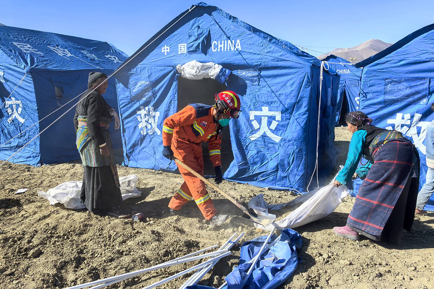 China doubles estimate for people affected in Tibet quake to 120,000